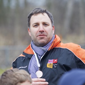 Cedric - proud coach and father of the Tigers player of the match (with medal)